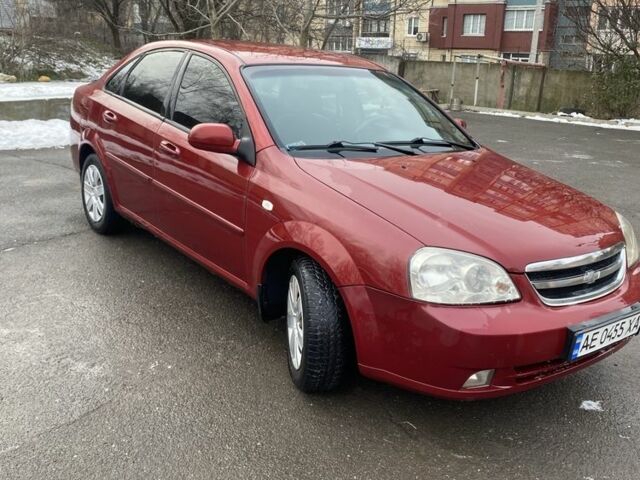 Красный Шевроле Лачетти, объемом двигателя 1.6 л и пробегом 300 тыс. км за 3100 $, фото 1 на Automoto.ua