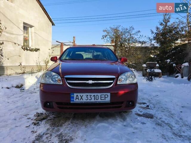 Красный Шевроле Лачетти, объемом двигателя 1.8 л и пробегом 195 тыс. км за 4000 $, фото 1 на Automoto.ua