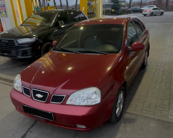 Красный Шевроле Лачетти, объемом двигателя 1.8 л и пробегом 156 тыс. км за 2999 $, фото 1 на Automoto.ua