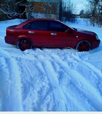 Червоний Шевроле Лачетті, об'ємом двигуна 1.8 л та пробігом 245 тис. км за 3900 $, фото 1 на Automoto.ua