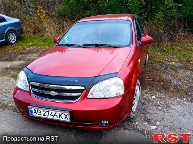 Красный Шевроле Лачетти, объемом двигателя 1.8 л и пробегом 312 тыс. км за 400 $, фото 1 на Automoto.ua
