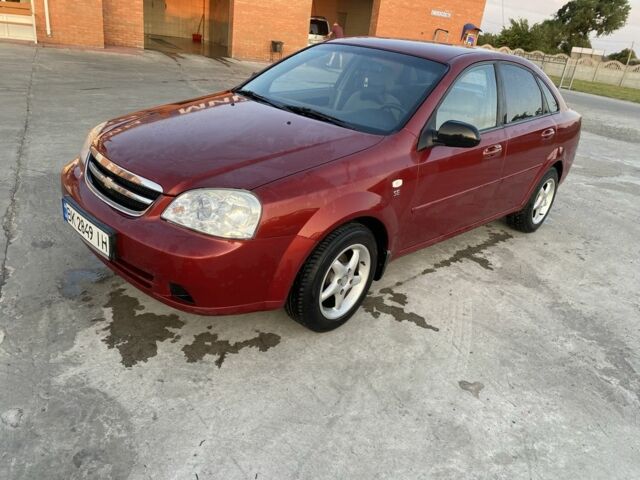 Красный Шевроле Лачетти, объемом двигателя 1.6 л и пробегом 220 тыс. км за 3600 $, фото 1 на Automoto.ua