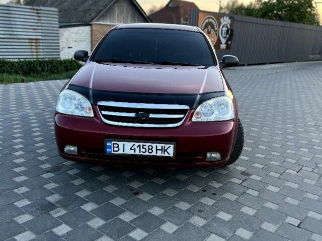 Червоний Шевроле Лачетті, об'ємом двигуна 1.6 л та пробігом 202 тис. км за 5500 $, фото 1 на Automoto.ua
