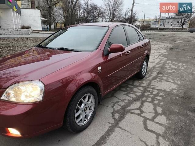Красный Шевроле Лачетти, объемом двигателя 1.8 л и пробегом 139 тыс. км за 5300 $, фото 1 на Automoto.ua