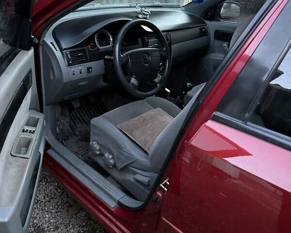 Красный Шевроле Лачетти, объемом двигателя 1.6 л и пробегом 368 тыс. км за 3300 $, фото 1 на Automoto.ua