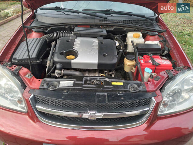 Красный Шевроле Лачетти, объемом двигателя 1.8 л и пробегом 205 тыс. км за 5600 $, фото 1 на Automoto.ua