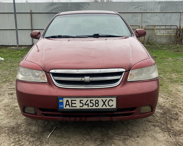 Красный Шевроле Лачетти, объемом двигателя 1.8 л и пробегом 267 тыс. км за 3500 $, фото 1 на Automoto.ua