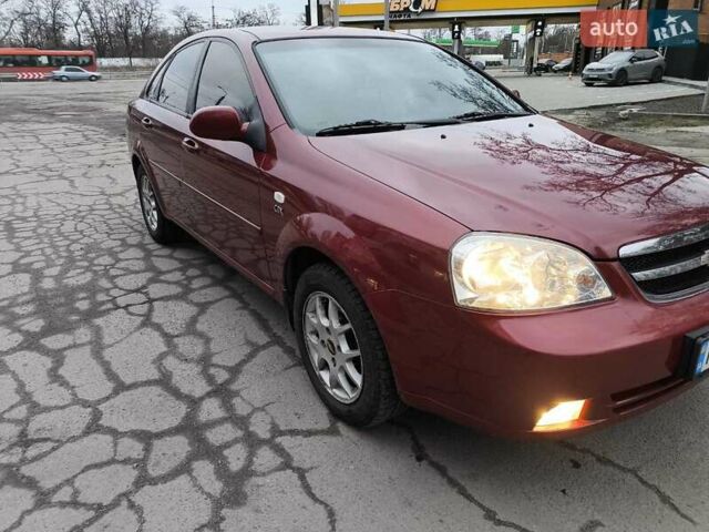 Красный Шевроле Лачетти, объемом двигателя 1.8 л и пробегом 125 тыс. км за 5600 $, фото 1 на Automoto.ua