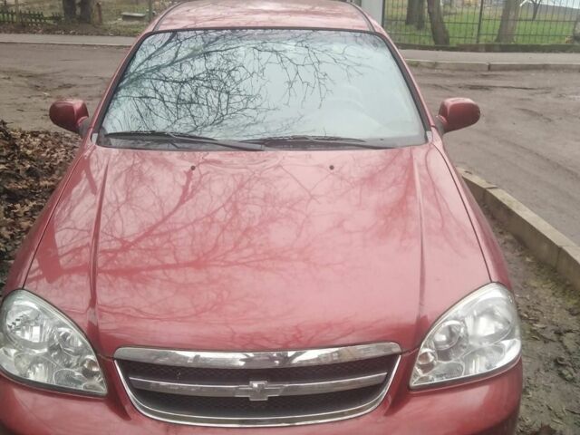 Красный Шевроле Лачетти, объемом двигателя 1.8 л и пробегом 140 тыс. км за 3250 $, фото 1 на Automoto.ua