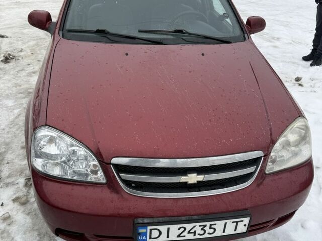 Красный Шевроле Лачетти, объемом двигателя 1.8 л и пробегом 330 тыс. км за 3300 $, фото 1 на Automoto.ua
