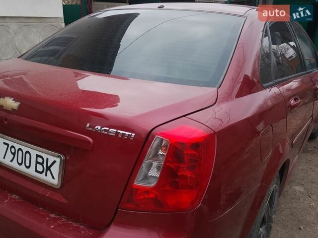 Красный Шевроле Лачетти, объемом двигателя 1.6 л и пробегом 235 тыс. км за 3100 $, фото 1 на Automoto.ua