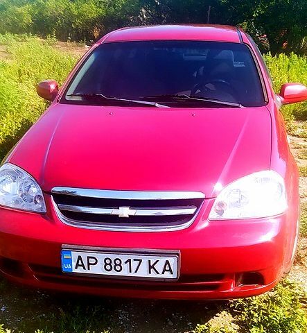 Красный Шевроле Лачетти, объемом двигателя 1.8 л и пробегом 271 тыс. км за 4250 $, фото 1 на Automoto.ua