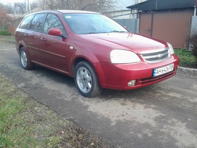Красный Шевроле Лачетти, объемом двигателя 1.8 л и пробегом 300 тыс. км за 2500 $, фото 1 на Automoto.ua