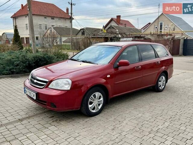 Красный Шевроле Лачетти, объемом двигателя 1.8 л и пробегом 398 тыс. км за 3600 $, фото 1 на Automoto.ua