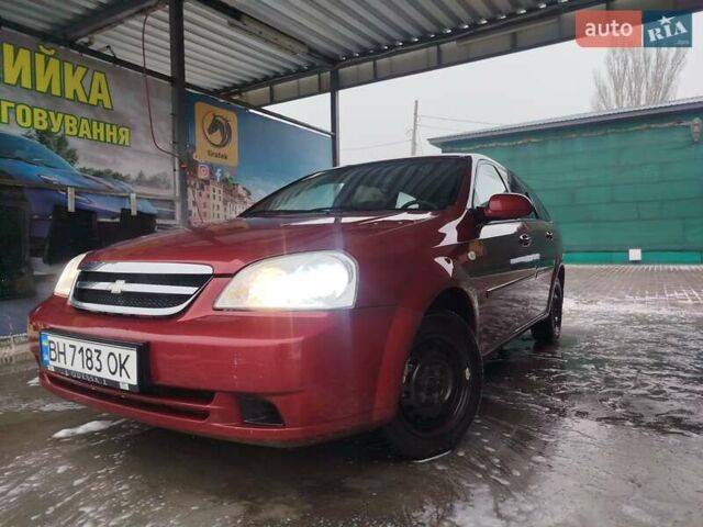Червоний Шевроле Лачетті, об'ємом двигуна 1.8 л та пробігом 397 тис. км за 3100 $, фото 1 на Automoto.ua