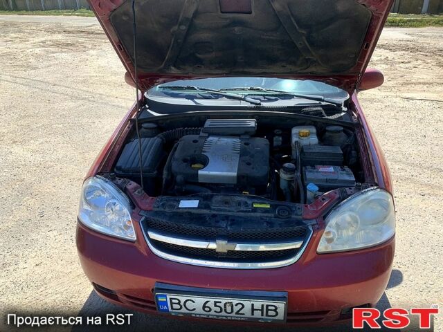 Червоний Шевроле Лачетті, об'ємом двигуна 1.8 л та пробігом 250 тис. км за 2750 $, фото 1 на Automoto.ua