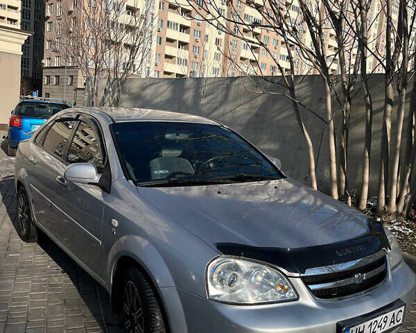 Серый Шевроле Лачетти, объемом двигателя 1.8 л и пробегом 204 тыс. км за 3600 $, фото 1 на Automoto.ua