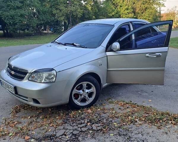Серый Шевроле Лачетти, объемом двигателя 1.8 л и пробегом 230 тыс. км за 3800 $, фото 1 на Automoto.ua