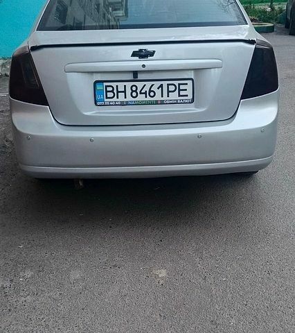 Сірий Шевроле Лачетті, об'ємом двигуна 1.8 л та пробігом 350 тис. км за 3750 $, фото 1 на Automoto.ua