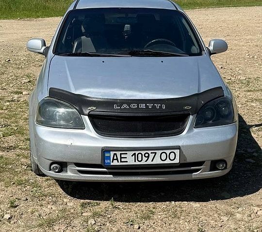 Серый Шевроле Лачетти, объемом двигателя 1.8 л и пробегом 266 тыс. км за 1550 $, фото 1 на Automoto.ua