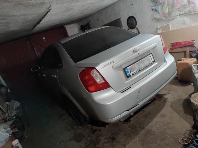 Серый Шевроле Лачетти, объемом двигателя 2 л и пробегом 276 тыс. км за 2400 $, фото 1 на Automoto.ua