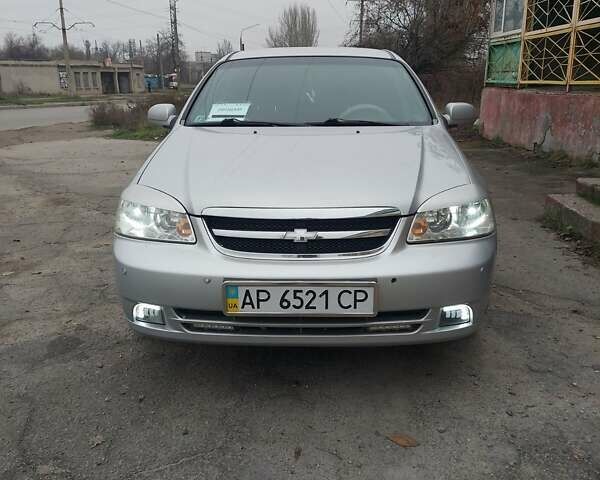 Серый Шевроле Лачетти, объемом двигателя 1.8 л и пробегом 318 тыс. км за 3900 $, фото 1 на Automoto.ua