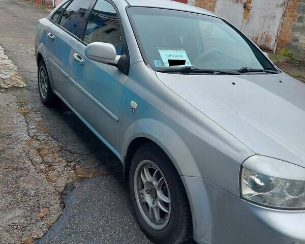 Сірий Шевроле Лачетті, об'ємом двигуна 1.8 л та пробігом 318 тис. км за 4200 $, фото 1 на Automoto.ua