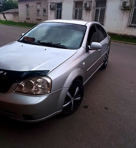 Серый Шевроле Лачетти, объемом двигателя 1.8 л и пробегом 325 тыс. км за 2600 $, фото 1 на Automoto.ua