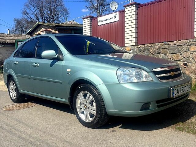 Серый Шевроле Лачетти, объемом двигателя 1.8 л и пробегом 206 тыс. км за 5150 $, фото 1 на Automoto.ua