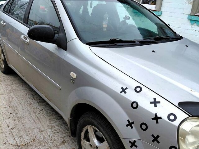 Серый Шевроле Лачетти, объемом двигателя 1.6 л и пробегом 320 тыс. км за 2500 $, фото 1 на Automoto.ua