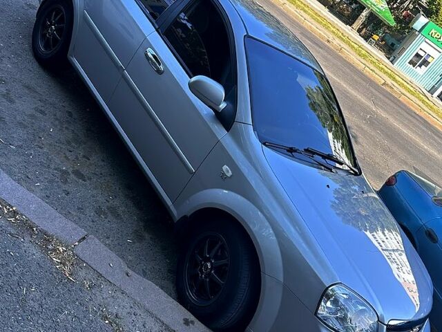 Серый Шевроле Лачетти, объемом двигателя 1.8 л и пробегом 390 тыс. км за 3650 $, фото 1 на Automoto.ua