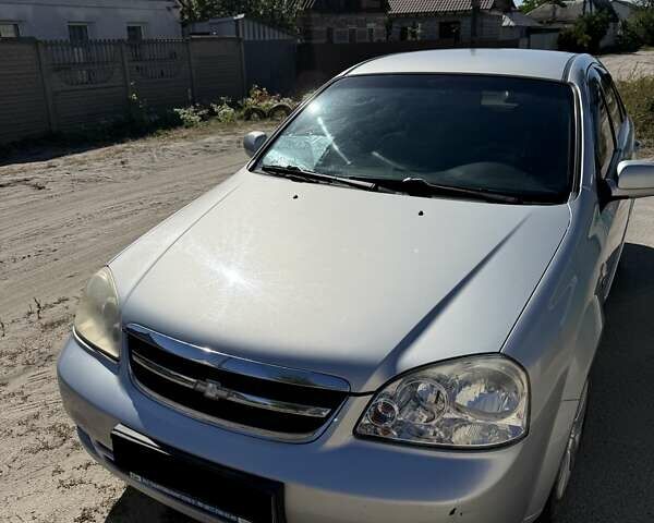 Серый Шевроле Лачетти, объемом двигателя 1.8 л и пробегом 149 тыс. км за 4800 $, фото 1 на Automoto.ua