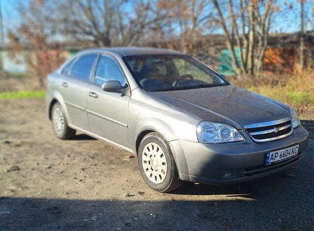 Серый Шевроле Лачетти, объемом двигателя 1.8 л и пробегом 260 тыс. км за 3100 $, фото 1 на Automoto.ua