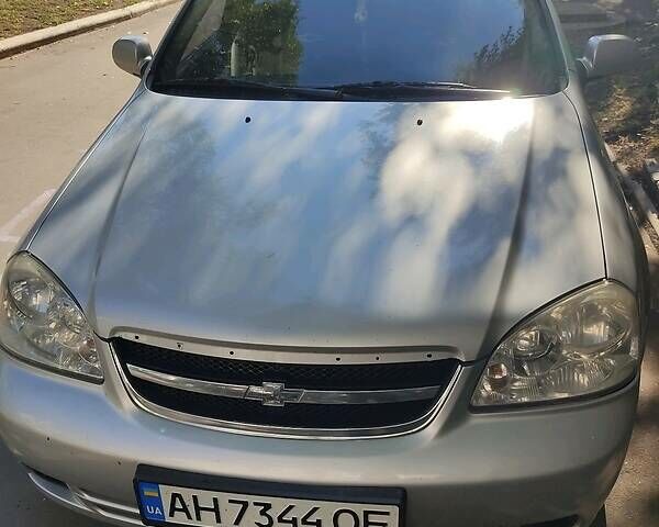 Серый Шевроле Лачетти, объемом двигателя 1.8 л и пробегом 240 тыс. км за 5000 $, фото 1 на Automoto.ua