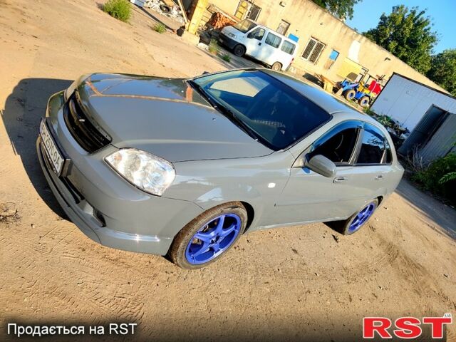 Серый Шевроле Лачетти, объемом двигателя 1.6 л и пробегом 228 тыс. км за 4999 $, фото 1 на Automoto.ua