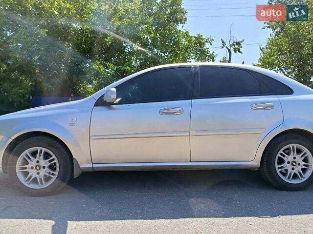 Серый Шевроле Лачетти, объемом двигателя 1.8 л и пробегом 214 тыс. км за 3700 $, фото 1 на Automoto.ua