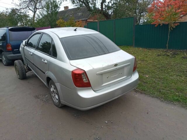 Серый Шевроле Лачетти, объемом двигателя 1.6 л и пробегом 300 тыс. км за 900 $, фото 1 на Automoto.ua