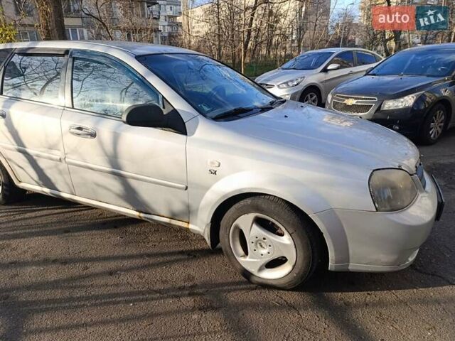 Серый Шевроле Лачетти, объемом двигателя 1.8 л и пробегом 305 тыс. км за 2750 $, фото 1 на Automoto.ua