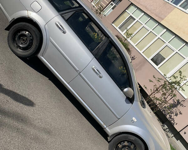 Сірий Шевроле Лачетті, об'ємом двигуна 1.8 л та пробігом 245 тис. км за 3399 $, фото 1 на Automoto.ua