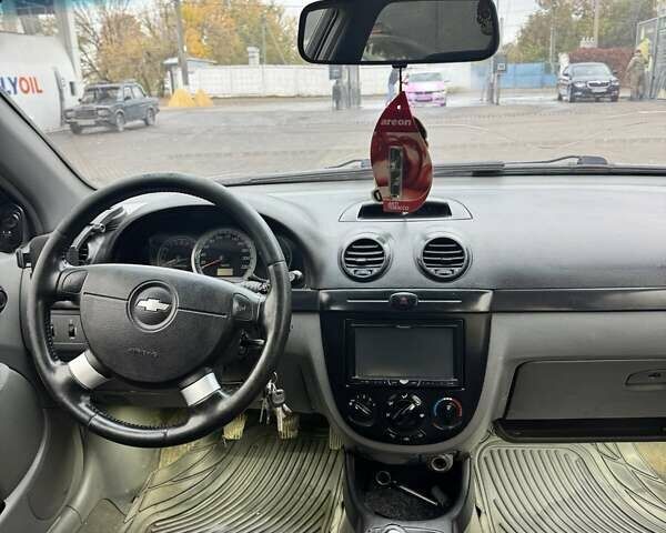 Серый Шевроле Лачетти, объемом двигателя 1.8 л и пробегом 320 тыс. км за 3450 $, фото 1 на Automoto.ua