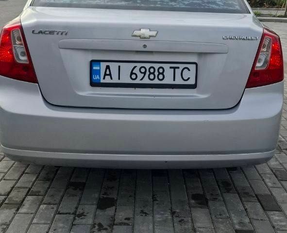 Сірий Шевроле Лачетті, об'ємом двигуна 1.6 л та пробігом 350 тис. км за 3491 $, фото 1 на Automoto.ua