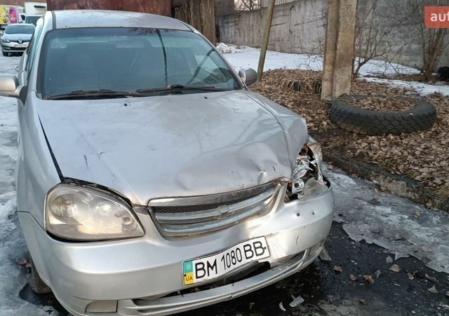 Серый Шевроле Лачетти, объемом двигателя 1.8 л и пробегом 200 тыс. км за 1050 $, фото 1 на Automoto.ua