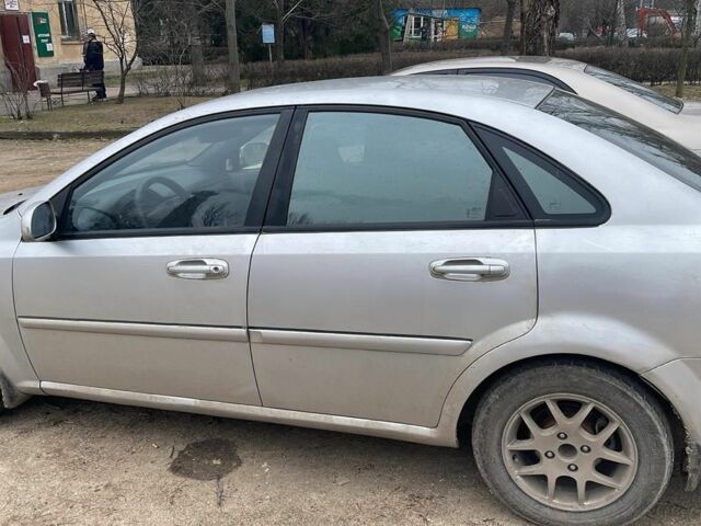 Серый Шевроле Лачетти, объемом двигателя 1.8 л и пробегом 246 тыс. км за 3600 $, фото 1 на Automoto.ua