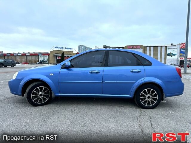 Синий Шевроле Лачетти, объемом двигателя 1.8 л и пробегом 350 тыс. км за 3999 $, фото 1 на Automoto.ua