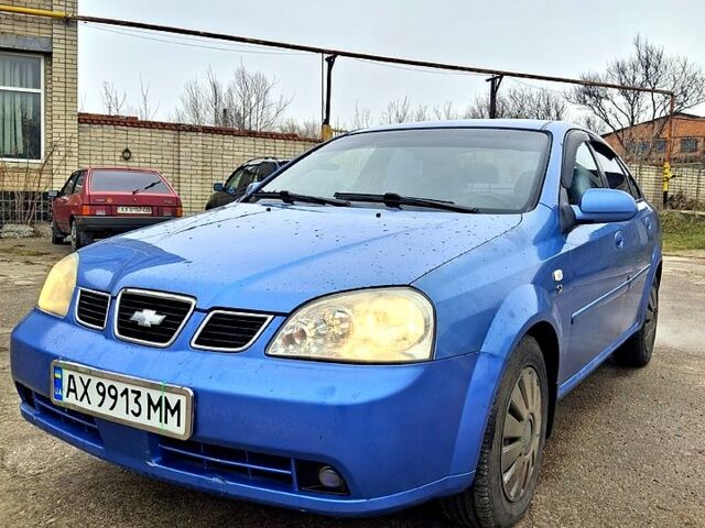 Синий Шевроле Лачетти, объемом двигателя 1.8 л и пробегом 230 тыс. км за 2250 $, фото 1 на Automoto.ua