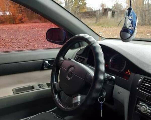 Синий Шевроле Лачетти, объемом двигателя 1.8 л и пробегом 233 тыс. км за 4499 $, фото 1 на Automoto.ua