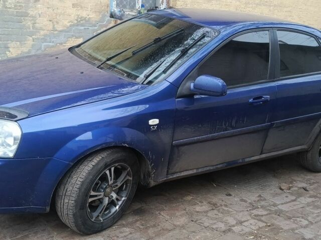 Синий Шевроле Лачетти, объемом двигателя 1.8 л и пробегом 230 тыс. км за 2450 $, фото 1 на Automoto.ua