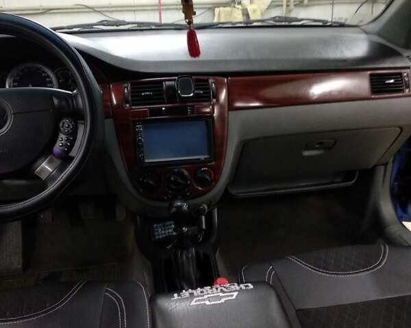 Синий Шевроле Лачетти, объемом двигателя 1.6 л и пробегом 164 тыс. км за 5700 $, фото 1 на Automoto.ua