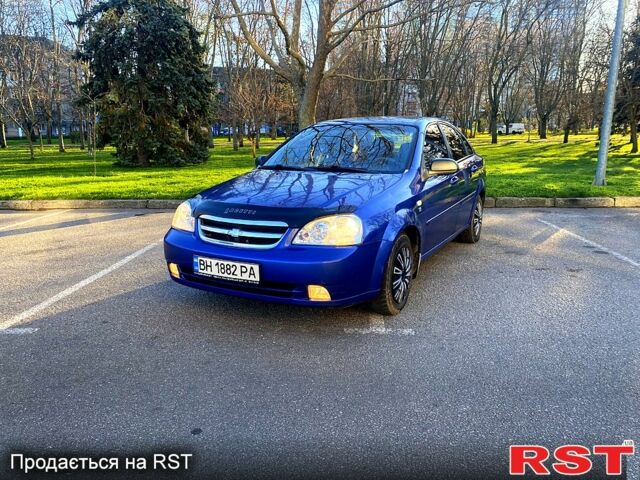 Синий Шевроле Лачетти, объемом двигателя 1.6 л и пробегом 244 тыс. км за 2999 $, фото 1 на Automoto.ua