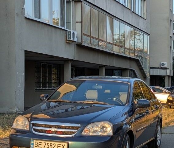 Синій Шевроле Лачетті, об'ємом двигуна 1.8 л та пробігом 246 тис. км за 3962 $, фото 1 на Automoto.ua